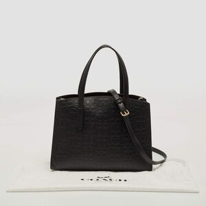 Coach Charlie Carryall
Black Signature
Embossed Leather Tote